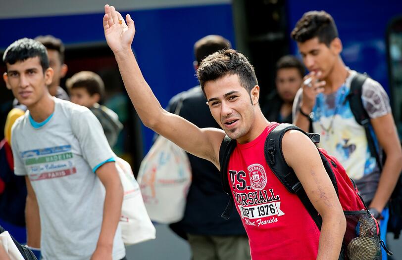 20 000 Flüchtlinge sind am Wochenende in München angekommen. Die Bilder vom Hauptbahnhof.