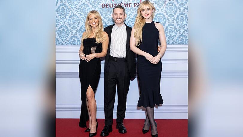 Sarah Michelle Gellar (li.), Elijah Wood und Kathryn Newton bei der Premiere von "Ready or Not 2: Here I Come" in Paris am 25. M&auml;rz 2026.