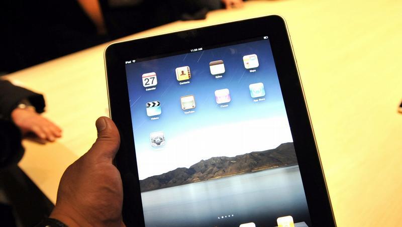 Der iPad, eine Mischung aus E-Reader, iPod und Tablet-PC Der iPad, eine Mischung aus E-Reader, iPod und Tablet-PC
