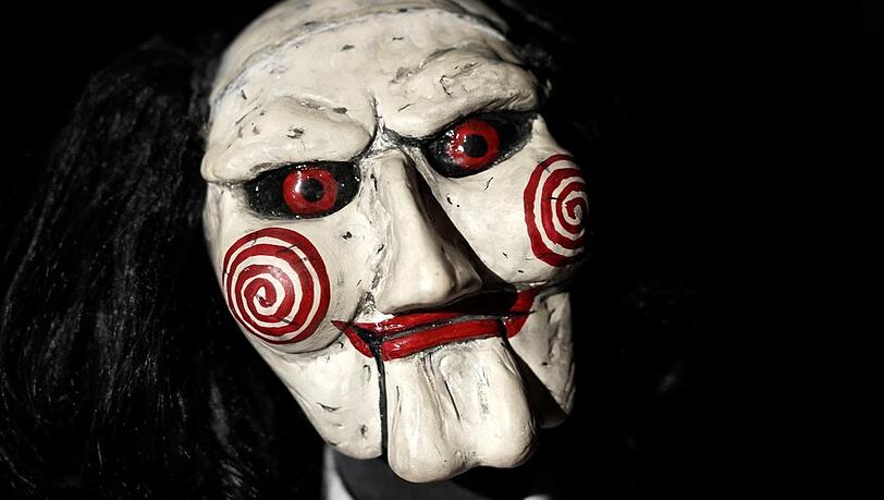 Eine Puppe aus dem Film "Saw".