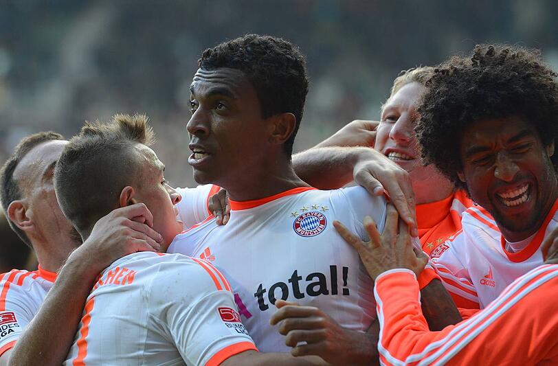 Luiz Gustavo (Mitte) spielt seit Januar 2011 für den FC Bayern.