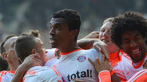 Luiz Gustavo (Mitte) spielt seit Januar 2011 für den FC Bayern.