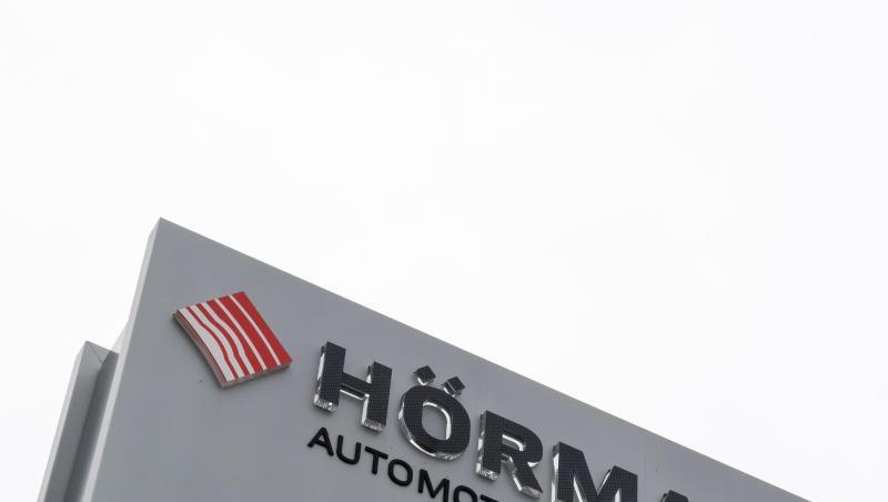 Ein Schild mit der Aufschrift "Hörmann - Automotive Penzberg" steht am Werkseingang. Foto: Peter Kneffel Ein Schild mit der Aufschrift "Hörmann - Automotive Penzberg" steht am Werkseingang. Foto: Peter Kneffel