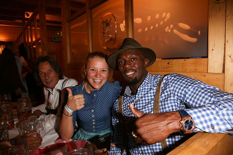 Miriam Gössner und Usain Bolt.