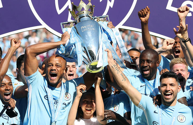Als Spieler mit Manchester City (l.)...