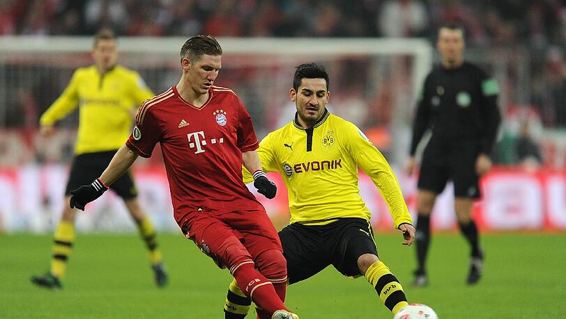 Bastian Schweinsteiger im Zweikampf mit Dortmunds Ilkay Gündogan. Bastian Schweinsteiger im Zweikampf mit Dortmunds Ilkay Gündogan.