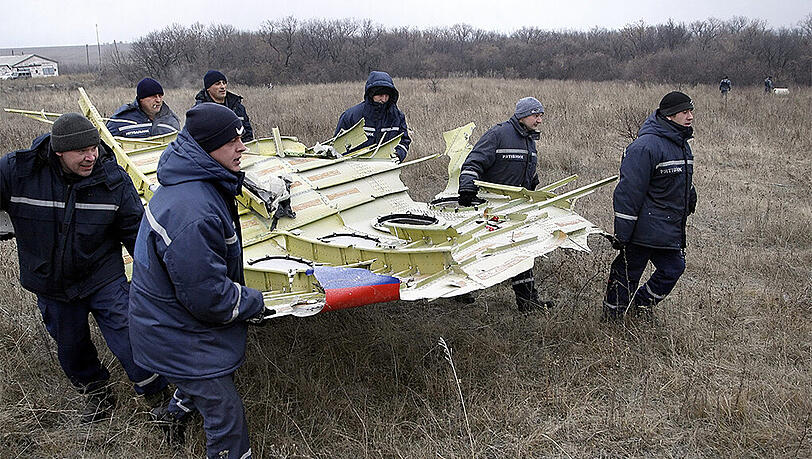 Trümmer von MH17 in der Ukraine: 298 Menschen starben. Trümmer von MH17 in der Ukraine: 298 Menschen starben.