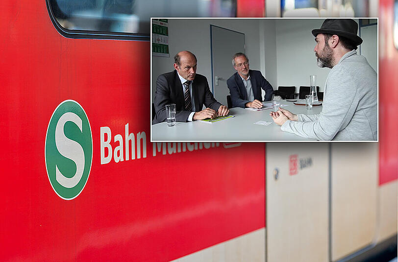 In seinem neuen Video spricht Michael Praetorius (r.) mit Franz Lindemair (m.) von der DB und Norbert Specht vom MVV.