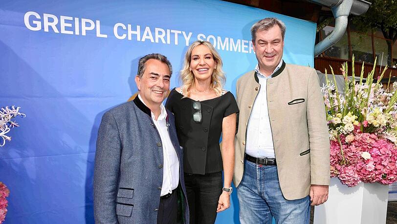 Saskia Greipl-Kostantinidis und Ehemann Stavros Kostantinidis (l.) gelten als DIE Top-Networker der Stadt. Auf ihren Charity-Events treffen sich regelmäßig Größen aus Politik, Wirtschaft und Promi-Welt - unter anderem auch Ministerpräsident Markus Söder.