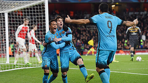Lionel Messi (Mitte) feierte mit Luis Suarez (r.) und Neymar das 2:0 für Barcelona gegen den FC Arsenal.