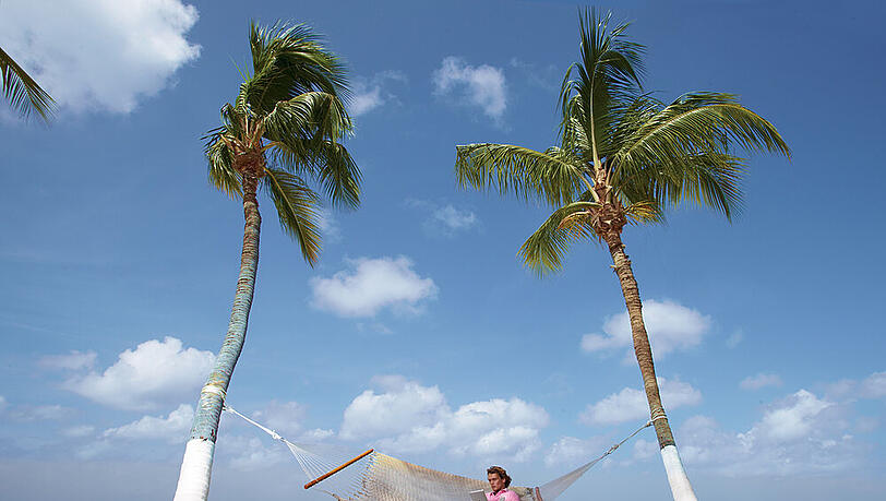 Relaxen unter Palmen im Luxusurlaub auf Aruba Relaxen unter Palmen im Luxusurlaub auf Aruba