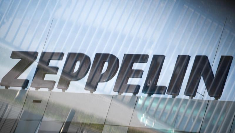 Das Logo des Zeppelin Konzerns ist durch eine Glasscheibe zu sehen. Foto: Felix Kästle/dpa/Symbolbild Das Logo des Zeppelin Konzerns ist durch eine Glasscheibe zu sehen. Foto: Felix Kästle/dpa/Symbolbild