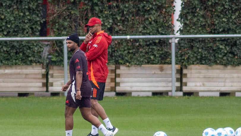 Vincent Kompany mit Serge Gnabry.