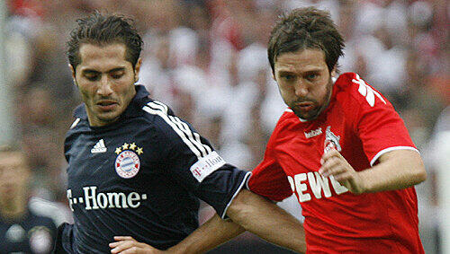 Kölns Fabrice Ehret (r.) mit Münchens Hamit Altintop Kölns Fabrice Ehret (r.) mit Münchens Hamit Altintop