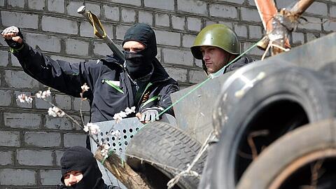Krise, Krieg, Konflikt? Paramilitärische Verbände in Slawjansk - dort kämpfen Separatisten für den Anschluss an Russland.