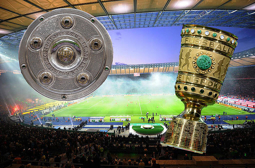Meisterschale und Pokal: Zum zehnten Mal in der Vereinsgeschichte kann der FC Bayern München am Samstag im Berliner Olympiastadion das Double perfekt machen.