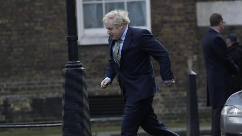 Im Laufschritt: Boris Johnson ist nach seiner Rückkehr aus dem Buckingham Palace auf dem Weg zurück in die 10 Downing Street. Im Laufschritt: Boris Johnson ist nach seiner Rückkehr aus dem Buckingham Palace auf dem Weg zurück in die 10 Downing Street.