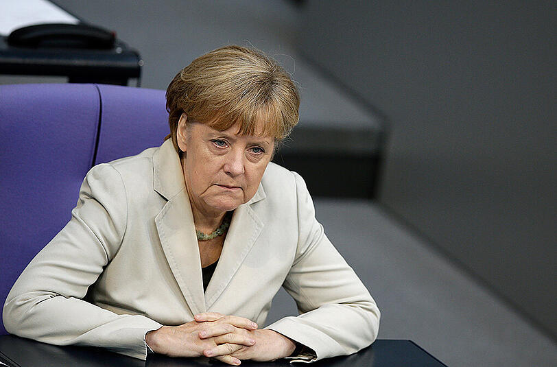 Bundeskanzlerin Angela Merkel will durch die rasche Anwendung der Sanktionen den Friedensprozess in der Ostukraine beschleunigen.
