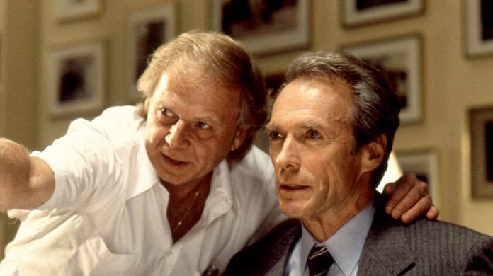 "In The Line of Fire", 1993: Wolfgang Petersen erklärt Clint Eastwood seine Idee des Secret-Service-Agenten, der den Präsidenten vor einem Attentat schützen will.