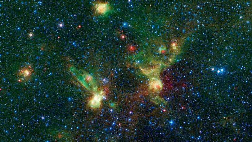 Grün-gelb-roter Sternennebel (Nebula), festgehalten vom Spitzer-Weltraumteleskop der Nasa.