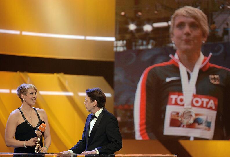 Christina Obergföll und Rudi Cerne.