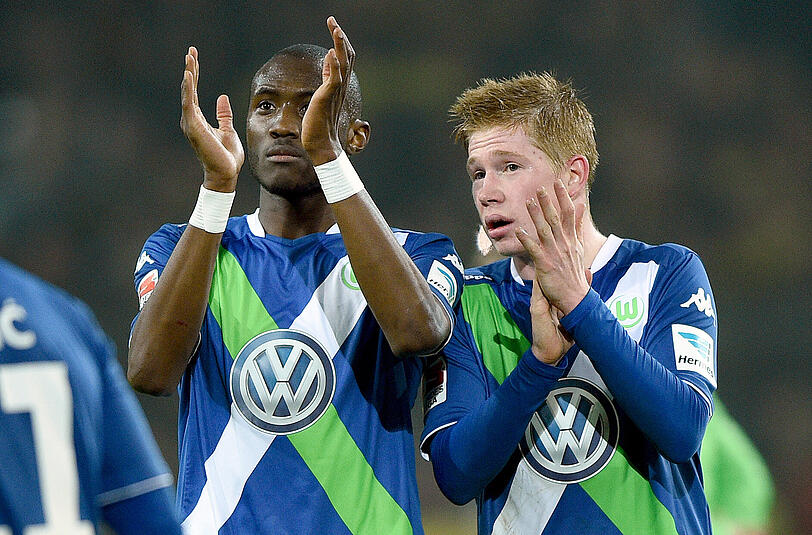 Der VfL Wolfsburg muss beim Rückrundenauftakt gegen den FC Bayern auf Josuha Guilavogui (l.) verzichten.
