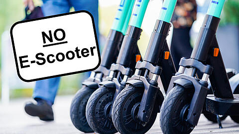 Mit dem "NO E-Scooter"-Schild (kleines Bild) will die Stadt die Fahrer auf die Verbotszonen aufmerksam machen.