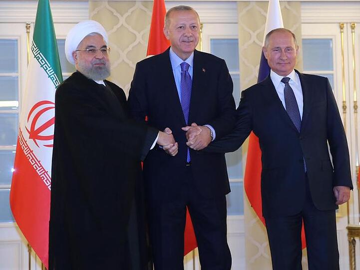 Irans Präsident Ruhani neben Gastgeber Erdogan und seinem russischen Amtskollegen Putin.