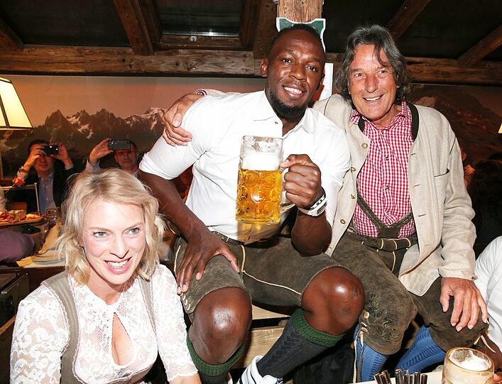 Usain Bolt und Hans-Wilhelm Müller Wohlfahrt