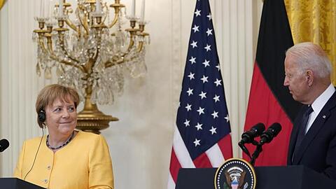 Merkels Abschiedsbesuch bei US-Präsident Biden wird von den Überschwemmungen überschattet.