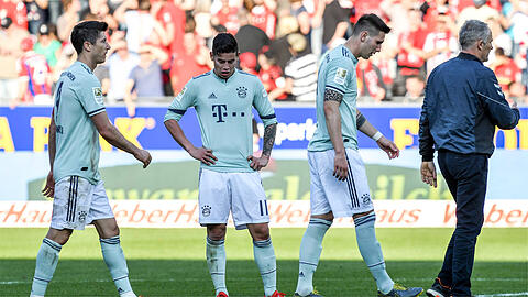 Bedient: die Bayern Robert Lewandowski, James und Niklas Süle (v.li.) in Freiburg.