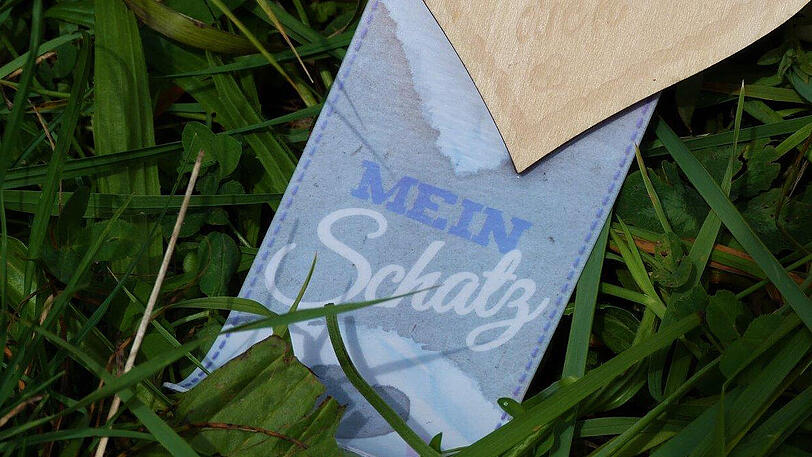 Auf einer Borte steht "Mein Schatz".