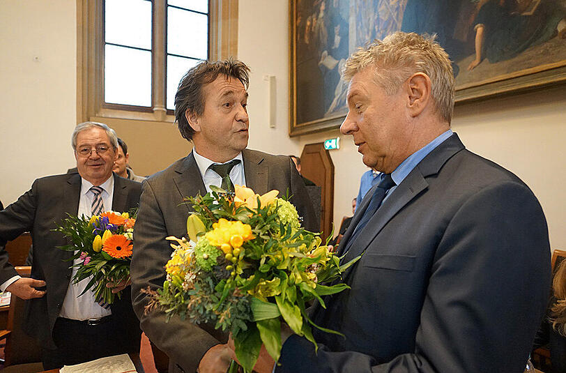 Thomas Böhle (m.) mit Oberbürgermeister Dieter Reiter (r.)