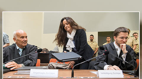 Die Angeklagte Beate Zschäpe am Montag zwischen ihren Anwälten Hermann Borchert (l.) und Mathias Grasel (r.). Foto: Peter Kneffel