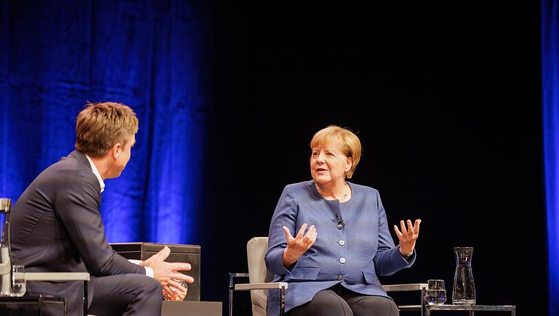 So viel Lob für Merz hatte Merkel schon lange nicht mehr übrig.