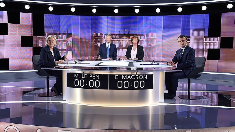 Schenkten sich am Mittwochabend bei der TV-Debatte nichts: Die Präsidentschaftskandidaten Marine Le Pen (l.) und Emmanuel Macron (r.)