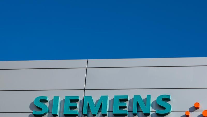 Logos und Schriftzüge am Gebäude des Medizintechnikkonzerns Siemens Healthineers. Foto: Daniel Karmann/dpa Logos und Schriftzüge am Gebäude des Medizintechnikkonzerns Siemens Healthineers. Foto: Daniel Karmann/dpa