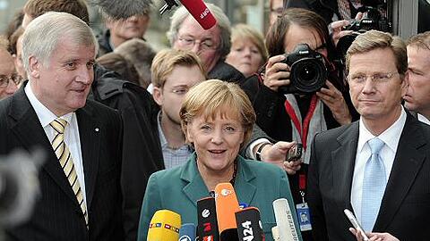 Horst Seehofer, Angela Merkel und Guido Westerwelle