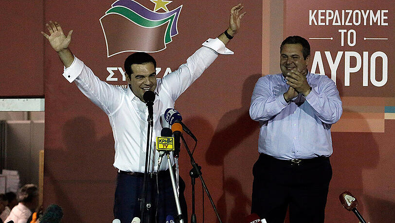 Alexis Tsipras bejubelt den überraschend deutlichen Wahlsieg seiner Partei Syriza. Alexis Tsipras bejubelt den überraschend deutlichen Wahlsieg seiner Partei Syriza.