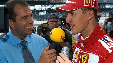 Kai Ebel interviewt Michael Schumacher beim Großen Preis der USA im Jahr 2000.