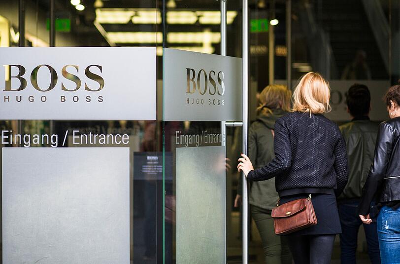 Hohe Ausgaben für Ladenschließungen belasten die Bilanz des Modeunternehmens Hugo Boss. Foto: Christoph Schmidt/Archiv