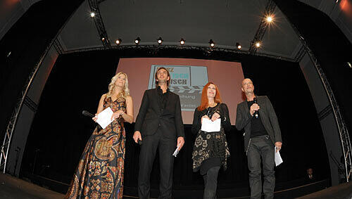 Die Moderatorin Tina Kaiser (l-r) und die Jurymitglieder Produzent Max Wiedemann, Schauspielerin Andrea Sawatzki und Schauspieler Christian Berkel Die Moderatorin Tina Kaiser (l-r) und die Jurymitglieder Produzent Max Wiedemann, Schauspielerin Andrea Sawatzki und Schauspieler Christian Berkel