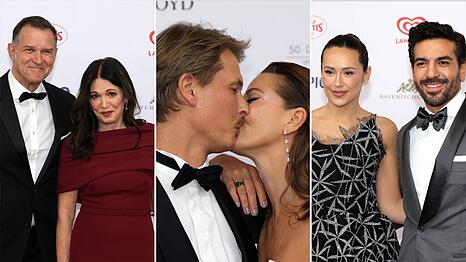 Von Jessica Schwarz gab es einen innigen Kuss f&uuml;r ihren Liebsten. Auch Iris Berben und Elyas M'Barek erschienen mit ihren Partnern zum Deutschen Filmball.