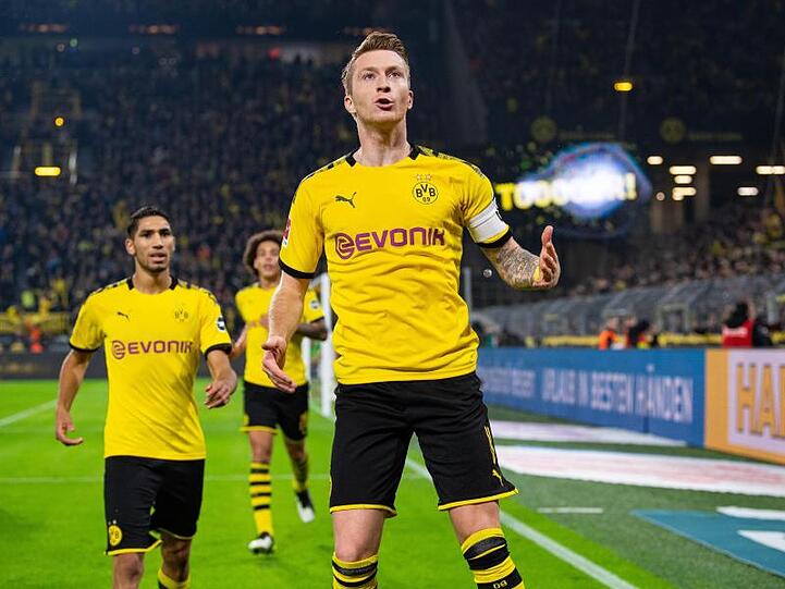 BVB-Kapitän Marco Reus (M) erzielte dem Dortmunder Siegtreffer.