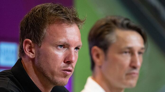 Trainer Julian Nagelsmann (l) vom FC Bayern München und Trainer Niko Kovac vom VfL Wolfsburg.