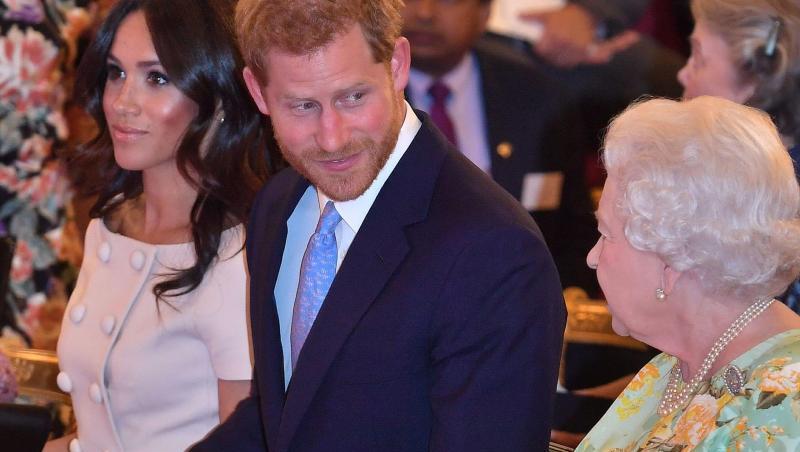 Königin Elizabeth II. (r-l), Prinz Harry und Herzogin Meghan im Sommer 2018 in London. Königin Elizabeth II. (r-l), Prinz Harry und Herzogin Meghan im Sommer 2018 in London.