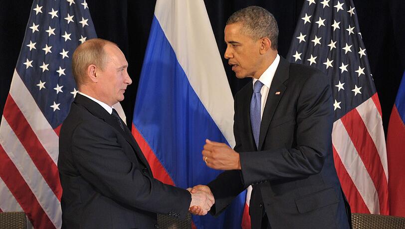 Ein Bild aus dem Jahr 2012: Putin (l.) und Obama beim Handshake auf dem G20-Gipfel in Mexiko. Ein Bild aus dem Jahr 2012: Putin (l.) und Obama beim Handshake auf dem G20-Gipfel in Mexiko.