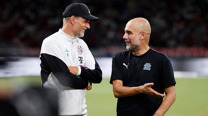 Komm, lass uns gemeinsam ins Halbfinale einziehen: ManCity-Coach Pep Guardiola (r.) mit Bayern-Trainer Thomas Tuchel.