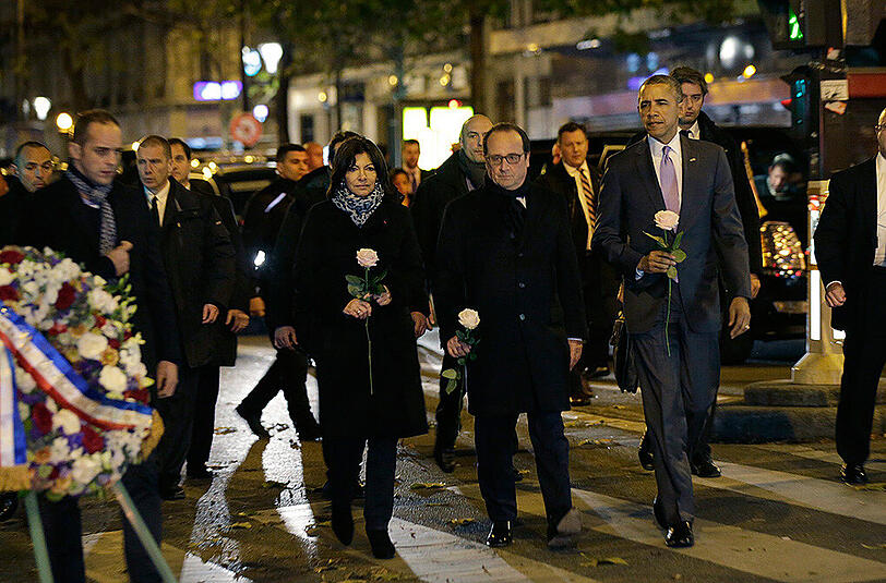 Die Bürgermeisterin von Paris Anne Hidalgo mit Frankreichs Präsident Francois Hollande (m.) und US-Präsident Barack Obama.