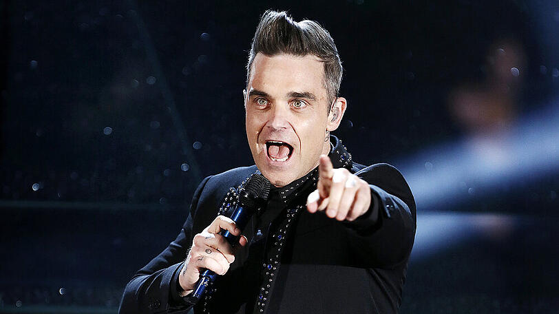 Robbie Williams: "Ich freue mich wirklich darauf, wieder mit den Jungs aufzutreten"